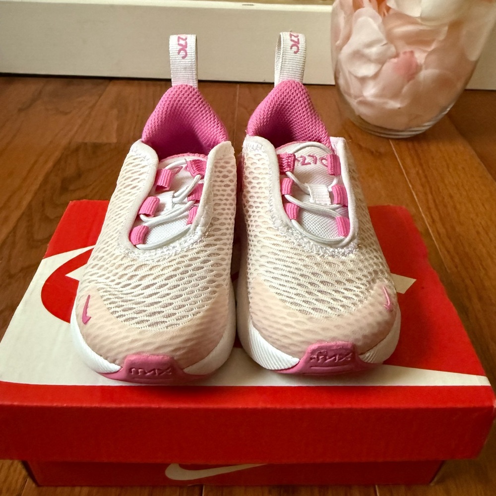 Nike White and Pink Mesh Sneakers with Modern Design
